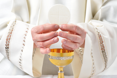 priest eucharistic rites