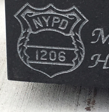 nypd emblem on headstone