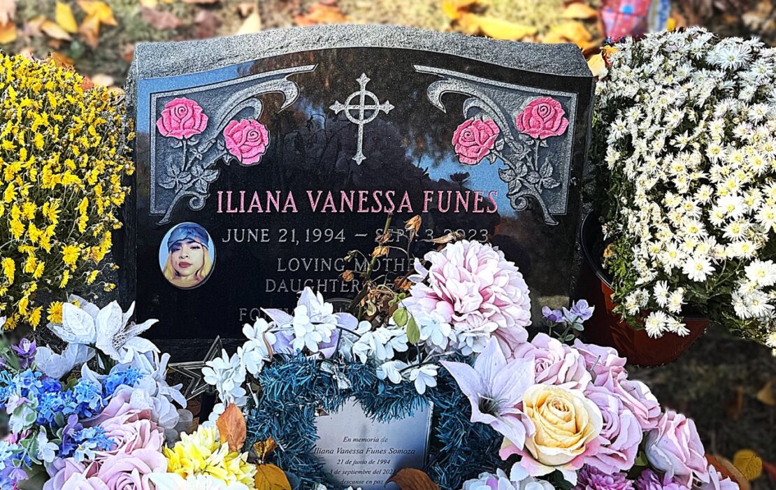 Upright monument with colorful inscriptions on black granite by St Charles Monuments
